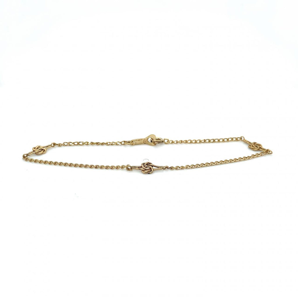 Flat Curb Link Bracelet With 3 Knot Features