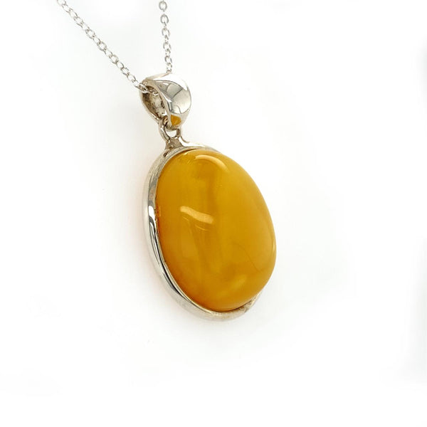 Sterling Silver Oval Butterscotch Amber Pendant
