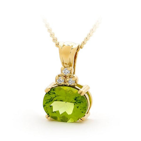 9ct Yellow Gold Oval Peridot (10x8mm) and Diamond Pendant. Display chain included